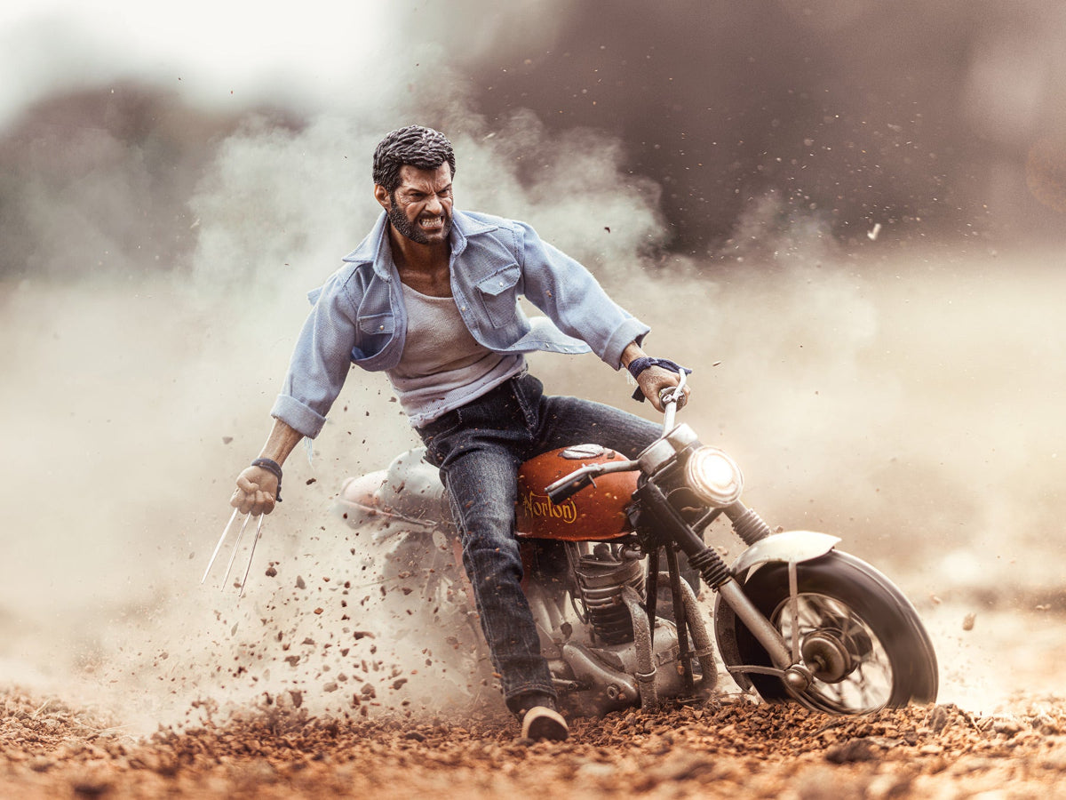 Logan, wolverine with claws out on a norton motorcycle